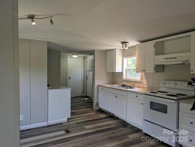 kitchen featuring dark wood-style floors, a textured ceiling, under cabinet range hood, white range with electric stovetop, and white cabinets