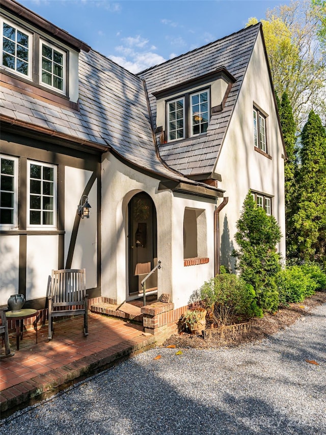341 Vanderbilt Rd, Asheville, NC 28803 - view of front of home featuring a high end roof and stucco siding