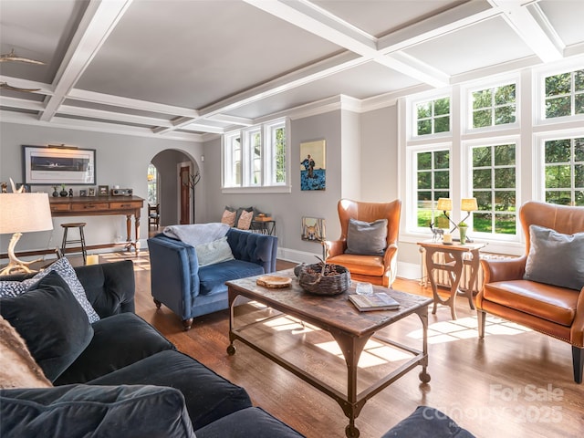 341 Vanderbilt Rd, Asheville, NC 28803 - living room with wood finished floors, beamed ceiling, baseboards, arched walkways, and coffered ceiling