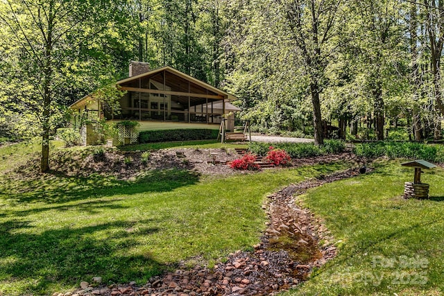 385 N Fork Rd, Black Mountain, NC 28711 - view of yard featuring a wooded view and a sunroom