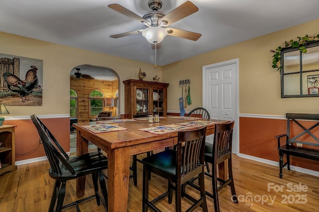385 N Fork Rd, Black Mountain, NC 28711 - dining space with baseboards, a ceiling fan, and light wood-style flooring