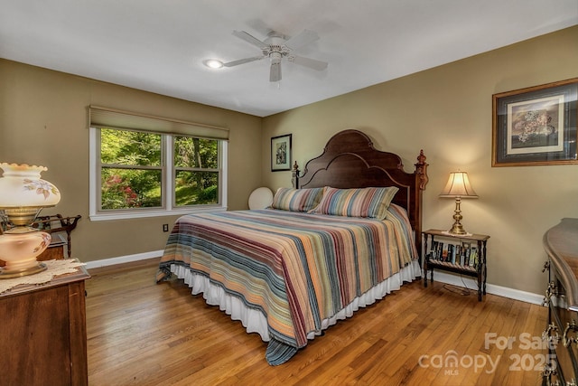 385 N Fork Rd, Black Mountain, NC 28711 - bedroom featuring baseboards, ceiling fan, and hardwood / wood-style floors