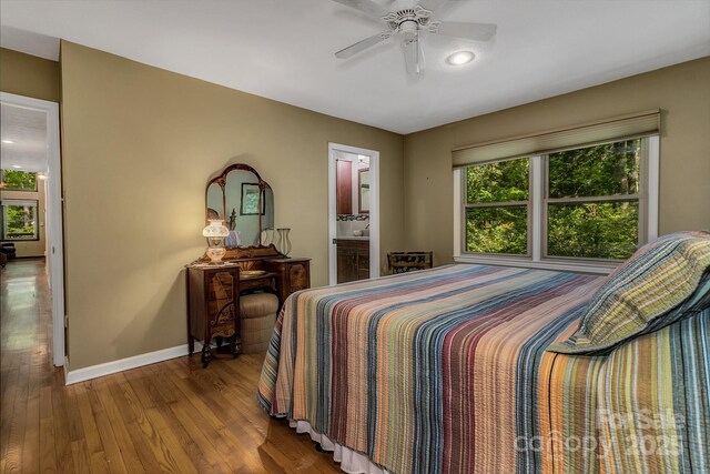 385 N Fork Rd, Black Mountain, NC 28711 - bedroom featuring baseboards, ceiling fan, wood finished floors, and ensuite bathroom
