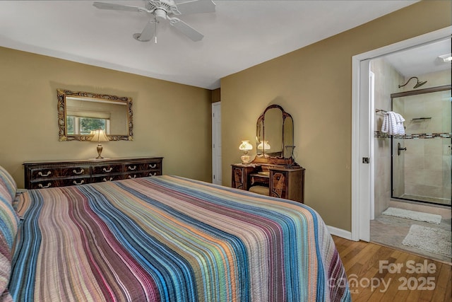 385 N Fork Rd, Black Mountain, NC 28711 - bedroom with baseboards, a ceiling fan, and wood finished floors