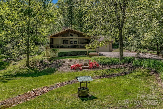 385 N Fork Rd, Black Mountain, NC 28711 - view of front of property featuring an attached garage, a front lawn, and driveway
