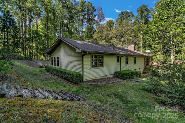 385 N Fork Rd, Black Mountain, NC 28711 - view of home's exterior featuring a lawn and a chimney