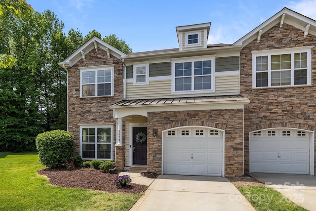 craftsman house with a standing seam roof, an attached garage, concrete driveway, and stone siding