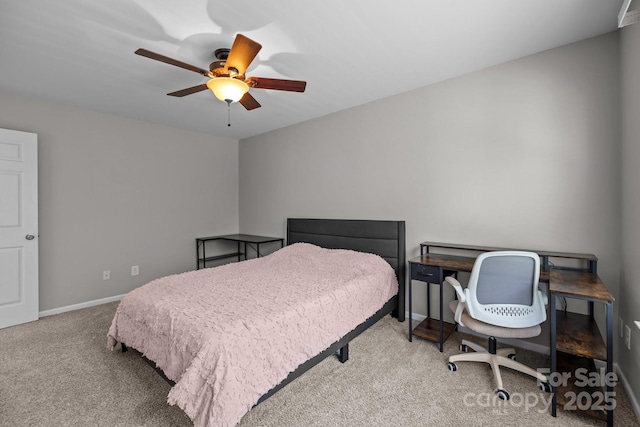 bedroom with baseboards, carpet, and a ceiling fan
