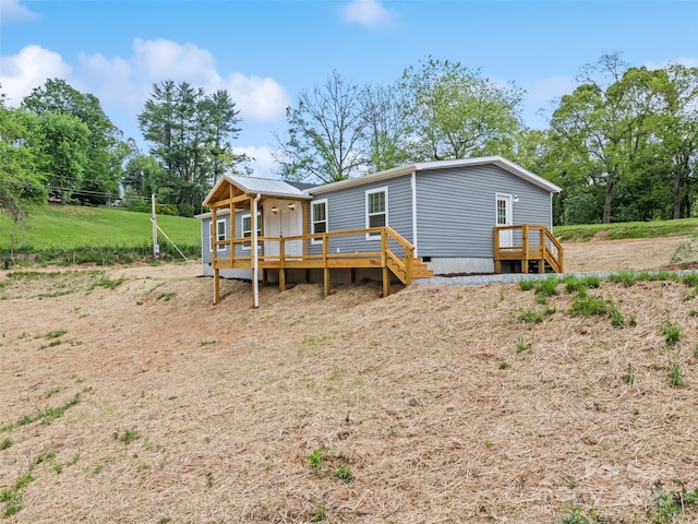 00 Thompson Cove Rd, Clyde, NC 28721 - rear view of property featuring metal roof and a deck