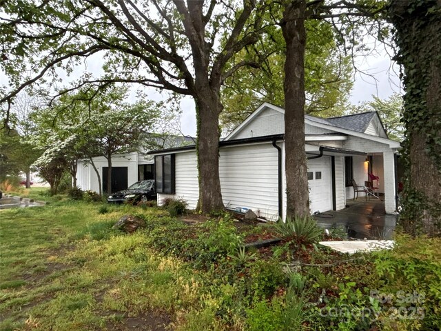 view of home's exterior featuring an attached garage