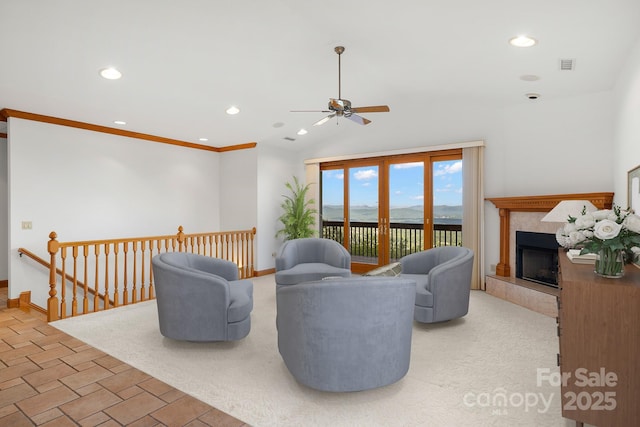 117 Distant View Dr, Asheville, NC 28803 - living area featuring a ceiling fan, recessed lighting, a tiled fireplace, baseboards, and lofted ceiling