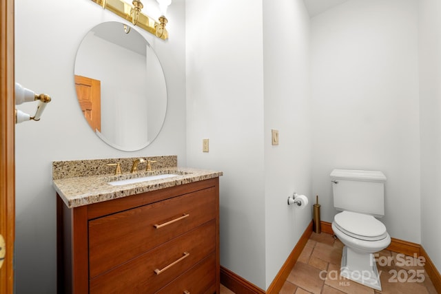 117 Distant View Dr, Asheville, NC 28803 - half bath featuring baseboards, toilet, vanity, and stone tile flooring