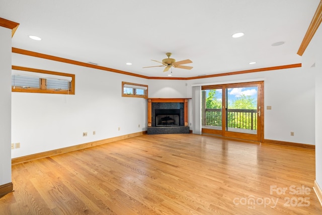 117 Distant View Dr, Asheville, NC 28803 - unfurnished living room with ceiling fan, light wood-style flooring, baseboards, a fireplace with raised hearth, and recessed lighting