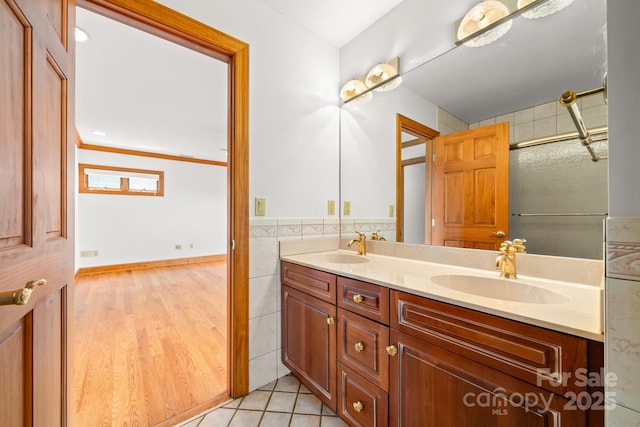 117 Distant View Dr, Asheville, NC 28803 - bathroom featuring double vanity and tile walls