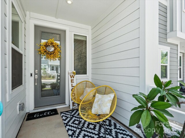 entrance to property with a porch