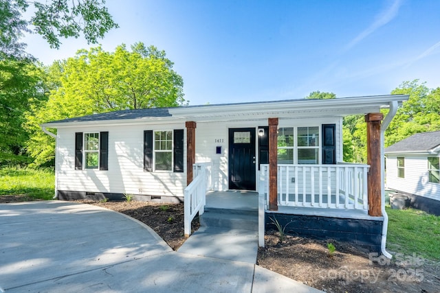 1411 Caldwell St, Gastonia, NC 28052 - ranch-style home featuring covered porch and crawl space
