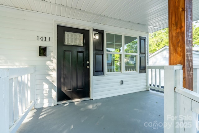 1411 Caldwell St, Gastonia, NC 28052 - property entrance featuring covered porch