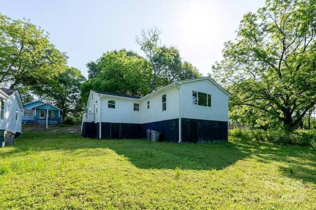 1411 Caldwell St, Gastonia, NC 28052 - view of home's exterior with a yard