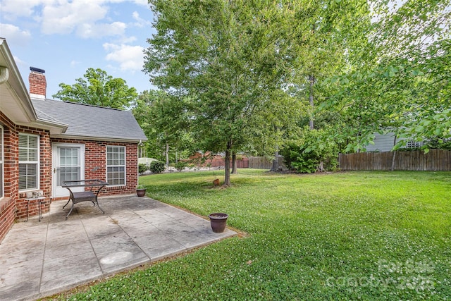 view of yard with a patio area