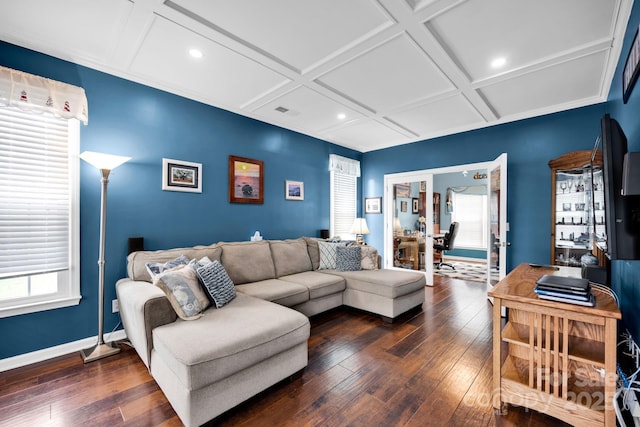 living area featuring a desk, plenty of natural light, hardwood / wood-style floors, coffered ceiling, and baseboards