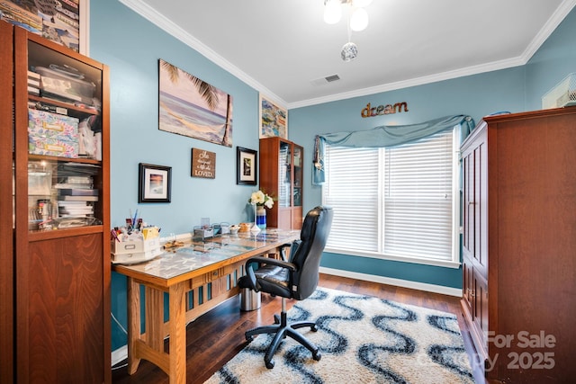 office featuring ornamental molding, wood finished floors, and baseboards