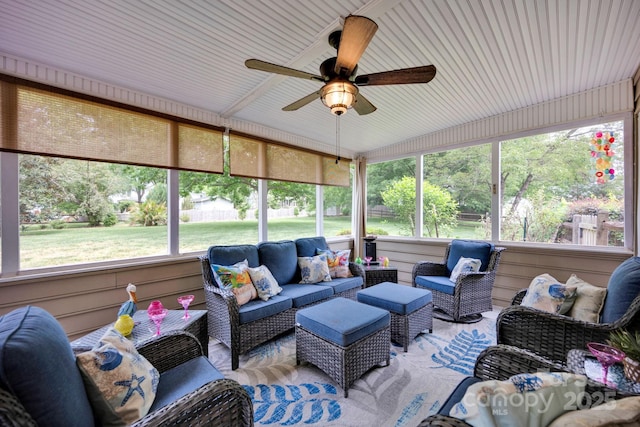 sunroom featuring ceiling fan and an outdoor hangout area