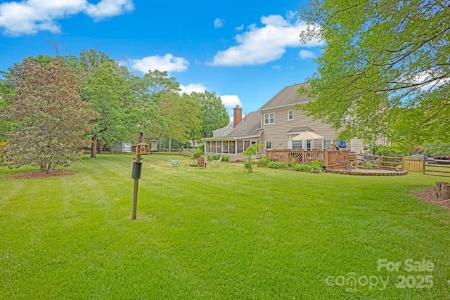 view of yard with a deck