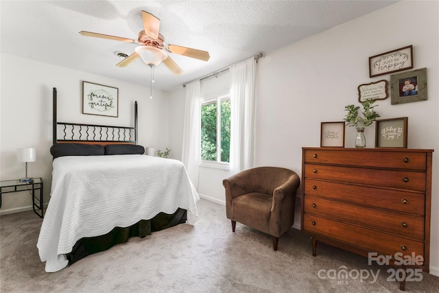 bedroom with baseboards, a ceiling fan, and carpet flooring