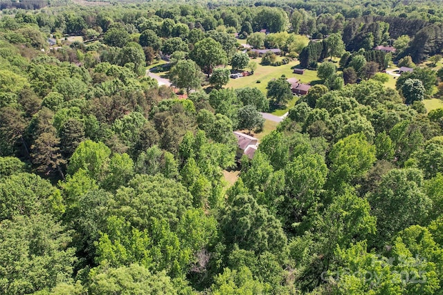 drone / aerial view with a forest view