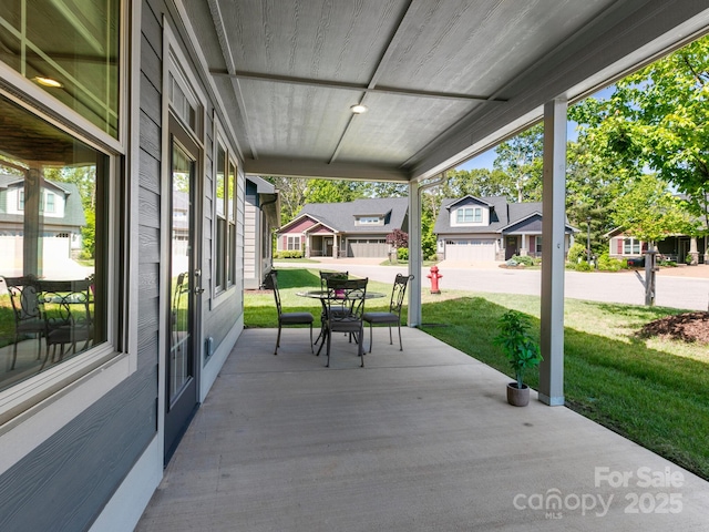 view of patio featuring a residential view and covered porch