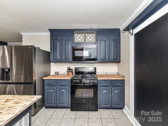 kitchen with black appliances, wooden counters, a textured ceiling, ornamental molding, and light tile patterned floors
