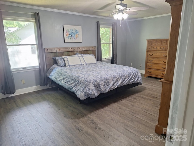 70 Cumberland Ct SW, Concord, NC 28025 - bedroom with wood finished floors, ornamental molding, baseboards, and a ceiling fan