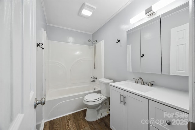 3828 Delgany Dr, Charlotte, NC 28215 - bathroom featuring wood finished floors, toilet, vanity, tub / shower combination, and crown molding