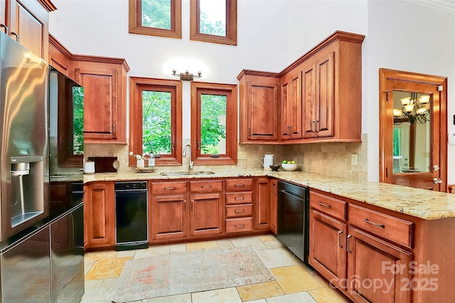 4509 Rosecliff Dr, Charlotte, NC 28277 - kitchen with black dishwasher, refrigerator with ice dispenser, a sink, and decorative backsplash