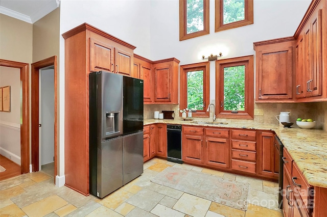 4509 Rosecliff Dr, Charlotte, NC 28277 - kitchen featuring stainless steel fridge with ice dispenser, a sink, tasteful backsplash, light stone countertops, and stone tile flooring