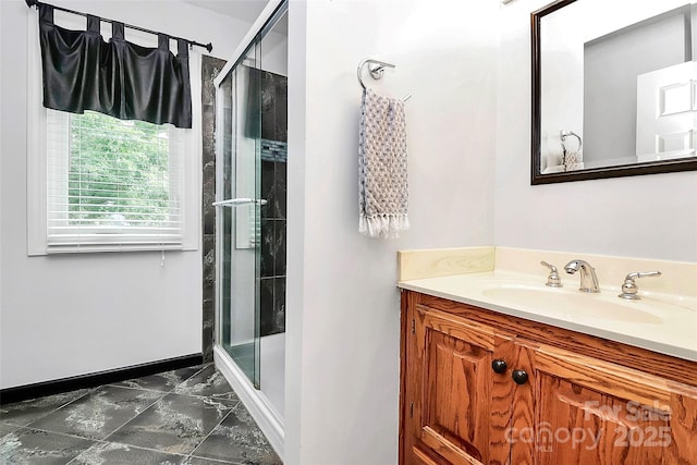 4509 Rosecliff Dr, Charlotte, NC 28277 - full bath with vanity, marble finish floors, a stall shower, and baseboards