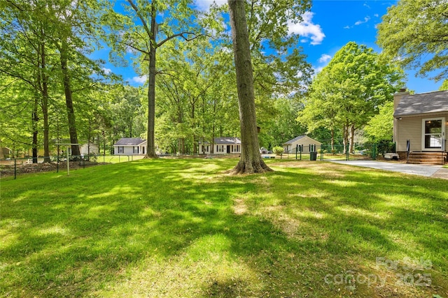 view of yard with fence