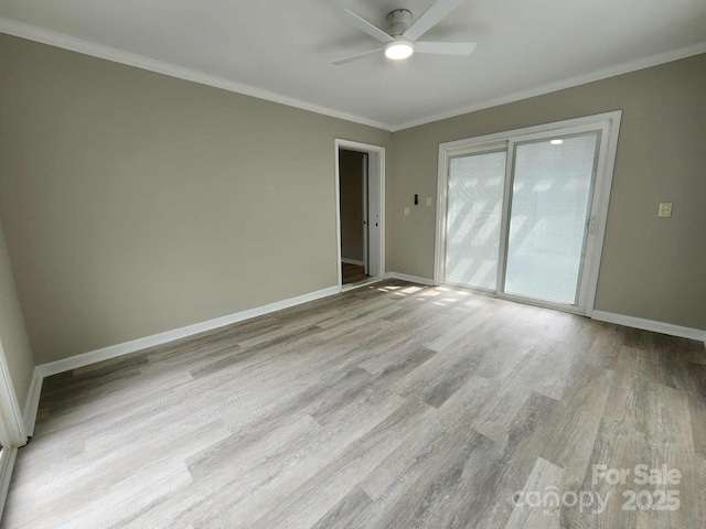 409 S Martin Luther King Jr Ave, Salisbury, NC 28144 - spare room with light wood-style floors, a ceiling fan, baseboards, and crown molding