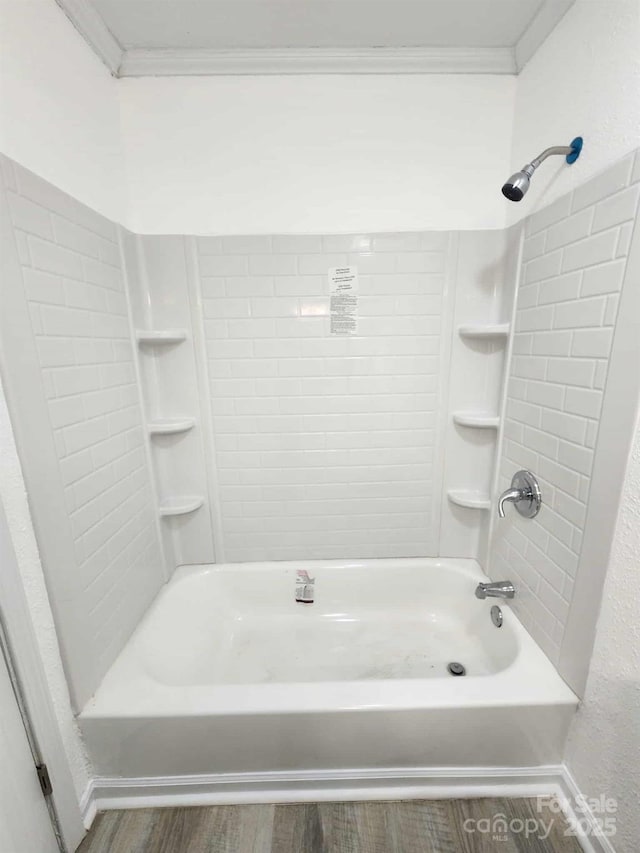 409 S Martin Luther King Jr Ave, Salisbury, NC 28144 - full bath with crown molding, wood finished floors, and bathing tub / shower combination