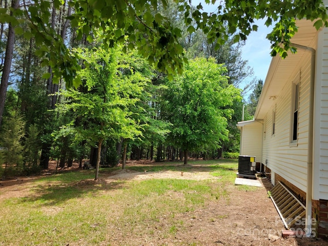 3634 Cartledge Creek Rd, Mount Gilead, NC 27306 - view of yard with central AC