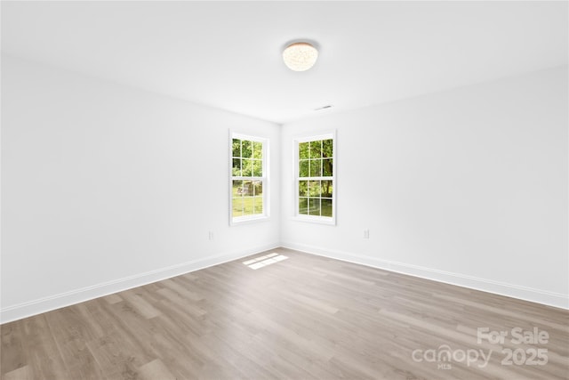 662 Camp Ferry Rd, Mooresboro, NC 28114 - empty room with wood finished floors and baseboards