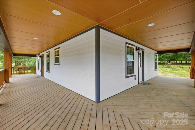 662 Camp Ferry Rd, Mooresboro, NC 28114 - wooden terrace with covered porch