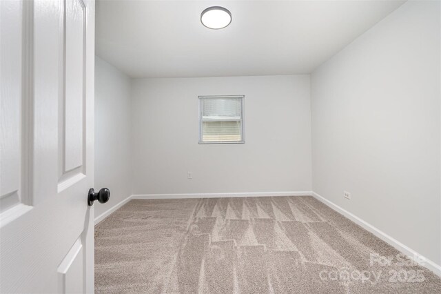 1211 N Boyce St, Gastonia, NC 28052 - carpeted spare room with baseboards