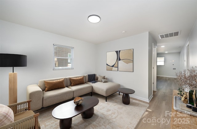 1211 N Boyce St, Gastonia, NC 28052 - living area with light wood finished floors, baseboards, and recessed lighting