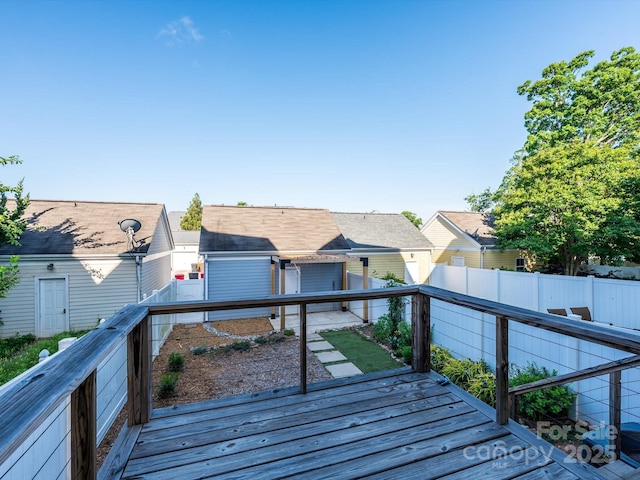 wooden terrace featuring a residential view