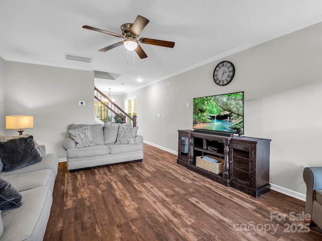 living room with visible vents, stairs, crown molding, and baseboards