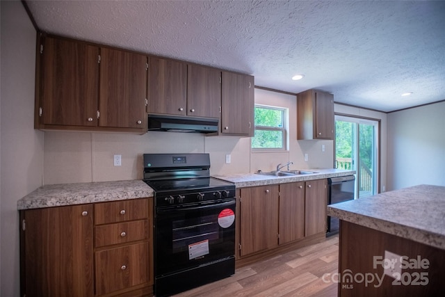 kitchen featuring extractor fan, black electric range, a sink, light wood-style flooring, and dishwasher