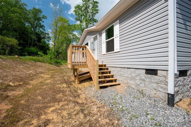 view of property exterior featuring crawl space