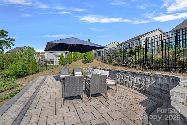 view of patio / terrace with fence and outdoor dining area