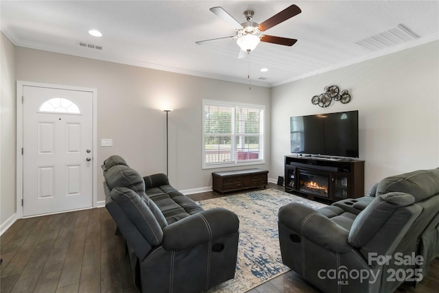 3015 Great Falls Highway, Chester, SC 29014 - living area with ornamental molding, dark wood-type flooring, ceiling fan, and visible vents